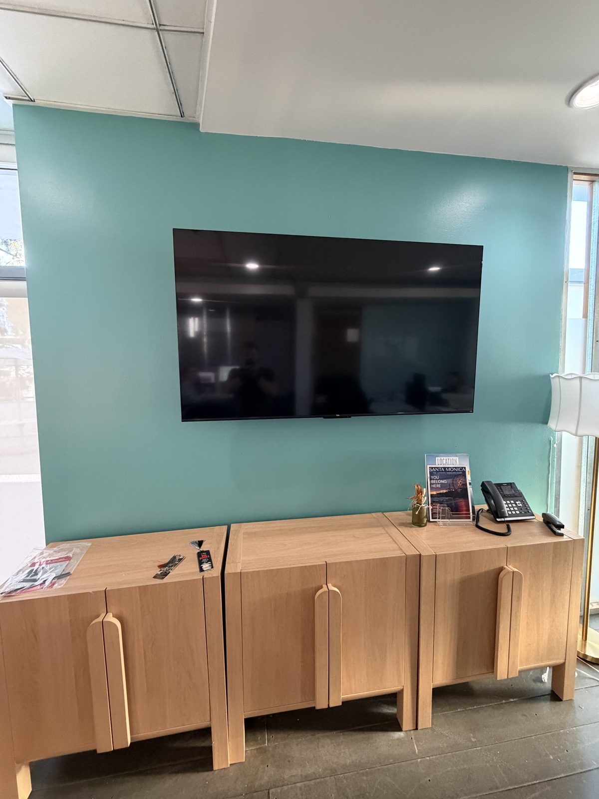 TV mounted with in-wall cord concealment
